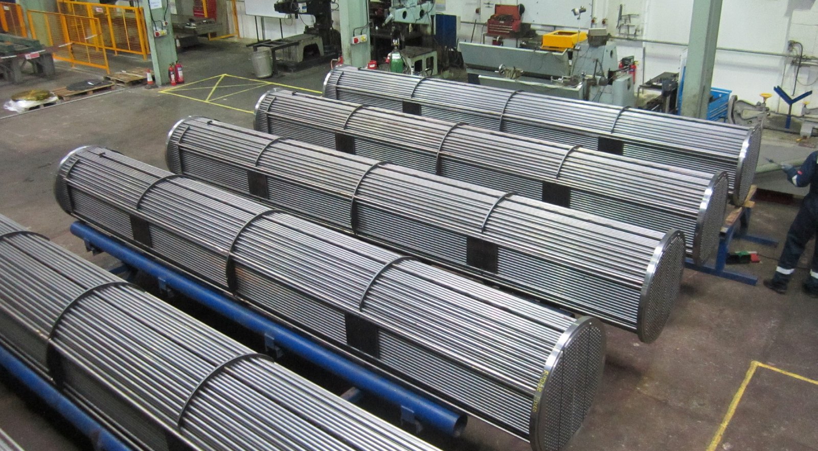 Manufactured heat exchanger tube bundles inside a Poole Process Equipment workshop